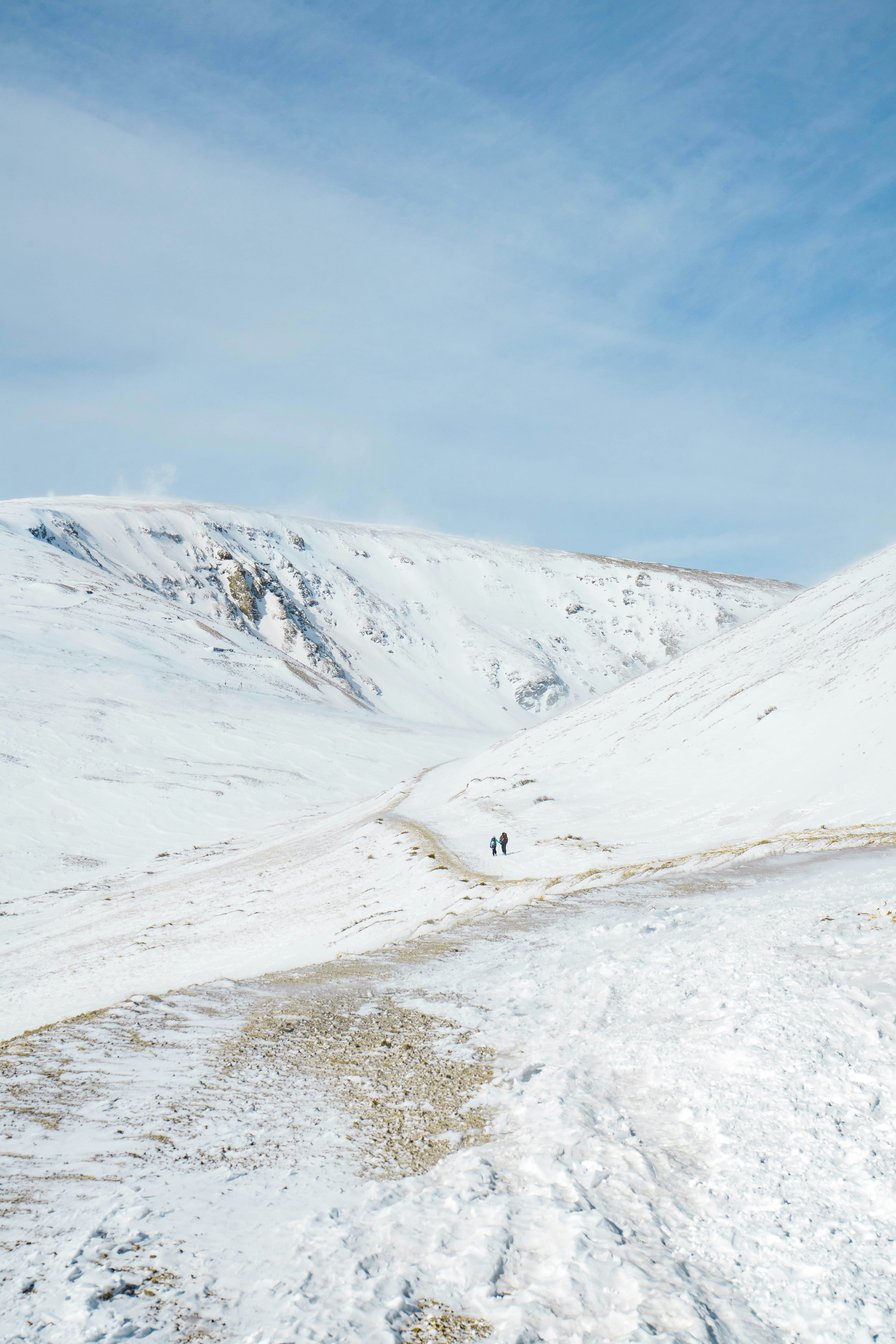 snow covered mountain under blue sky during daytime